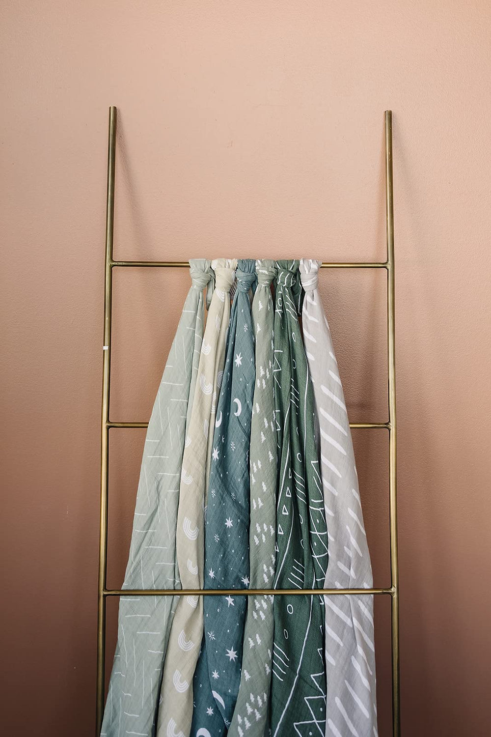 Mebie Baby swaddle folded flat to show generous 47x47 inch size.