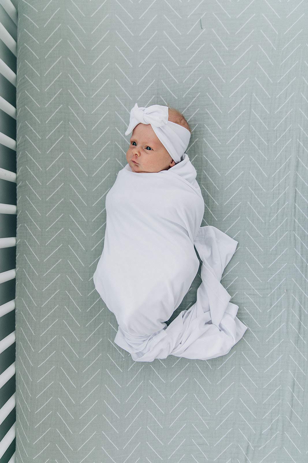 Mebie Baby swaddle demonstrates machine washable care for busy parents.