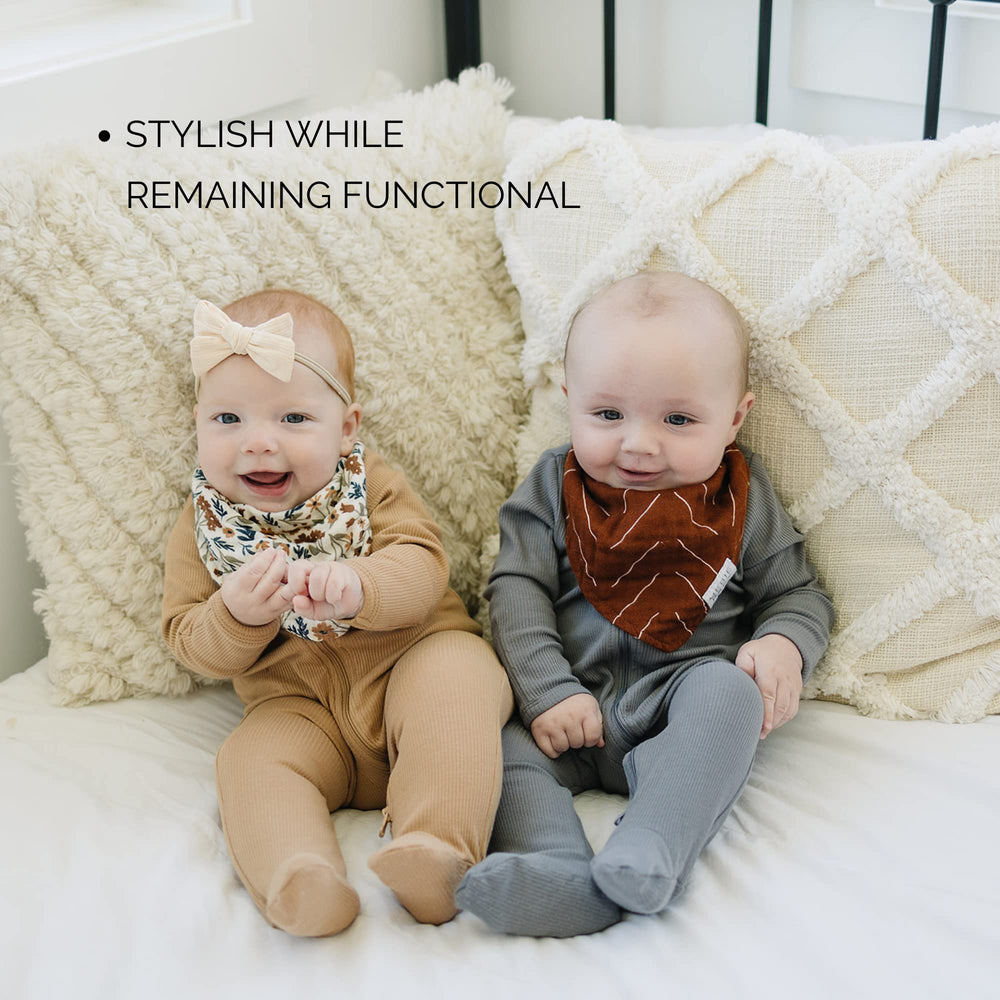 Mebie Baby floral bib closeup emphasizes gentle fibers for delicate skin.