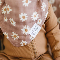 Mebie Baby bib in-use during feeding catches drool and spit-up.