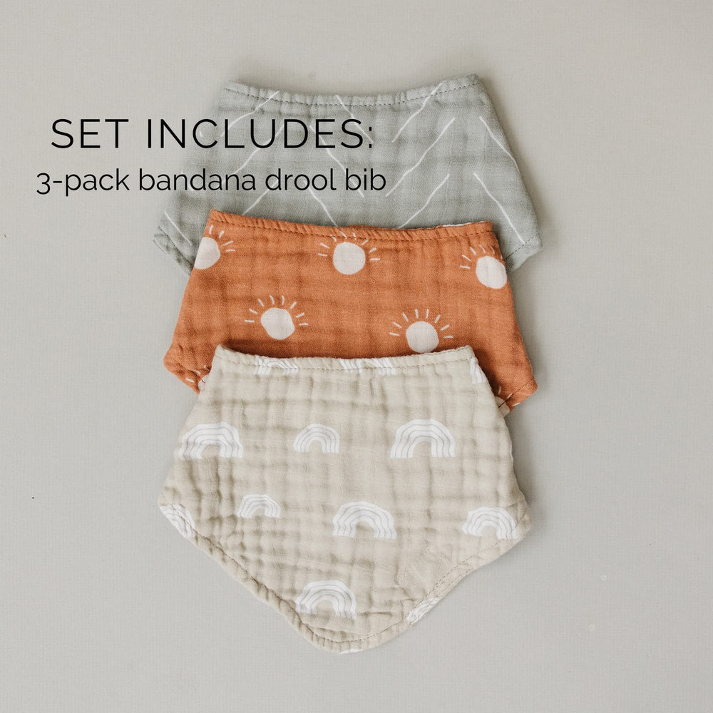 Mebie Baby muslin bib in neutral colors complements outfits