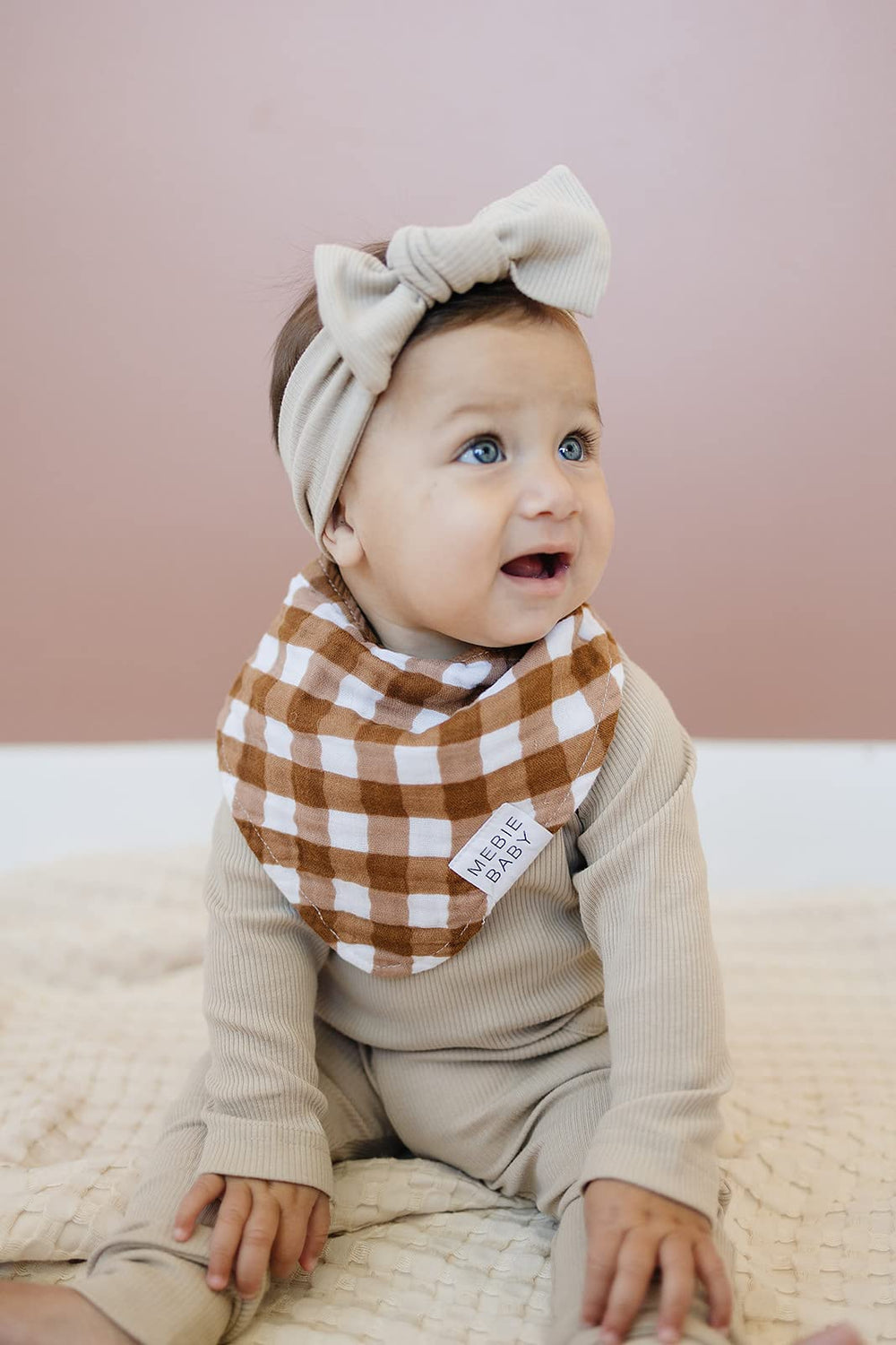 Mebie Baby muslin bib quick wipe and machine washable for busy parents.