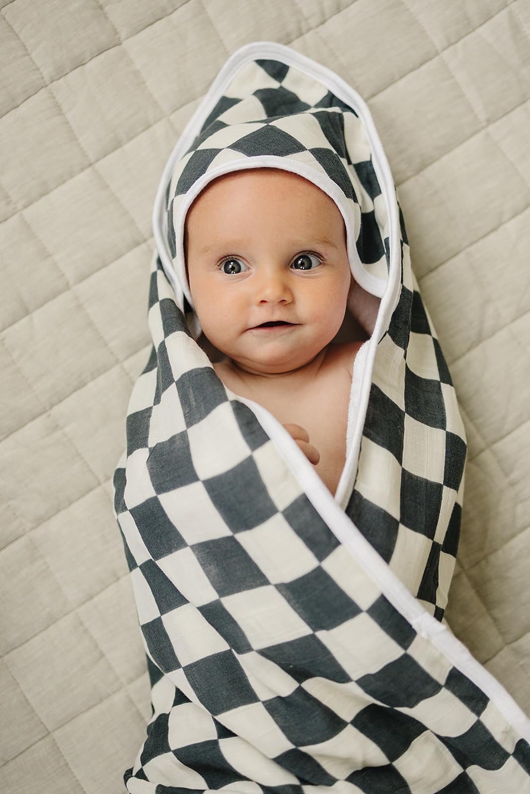 Mebie Baby charcoal checkered hooded towel adds stylish, practical bath time decor