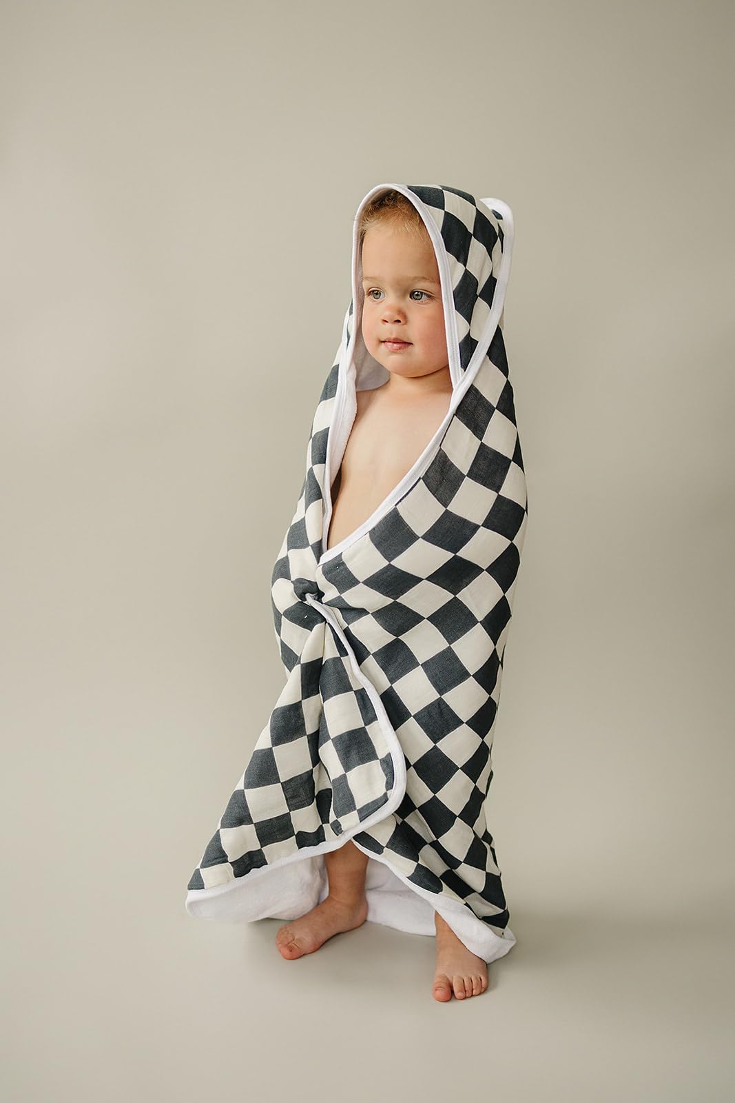 Mebie Baby hooded towel drying baby's hair after bath with charcoal checkered design