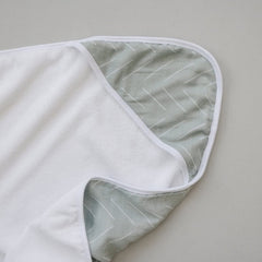 Mebie Baby Muslin Hooded Towel Desert Sage on baby for warm post-bath comfort