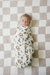 Mebie Baby Outlaw Cowboy Swaddle folded view shows versatile, modern neutral design for nursery decor.