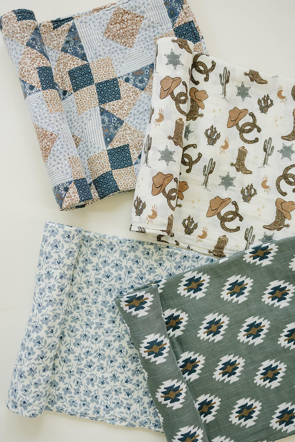 Mebie Baby Outlaw Cowboy Swaddle wrap demonstrates a secure wrap for cozy newborn cuddles.