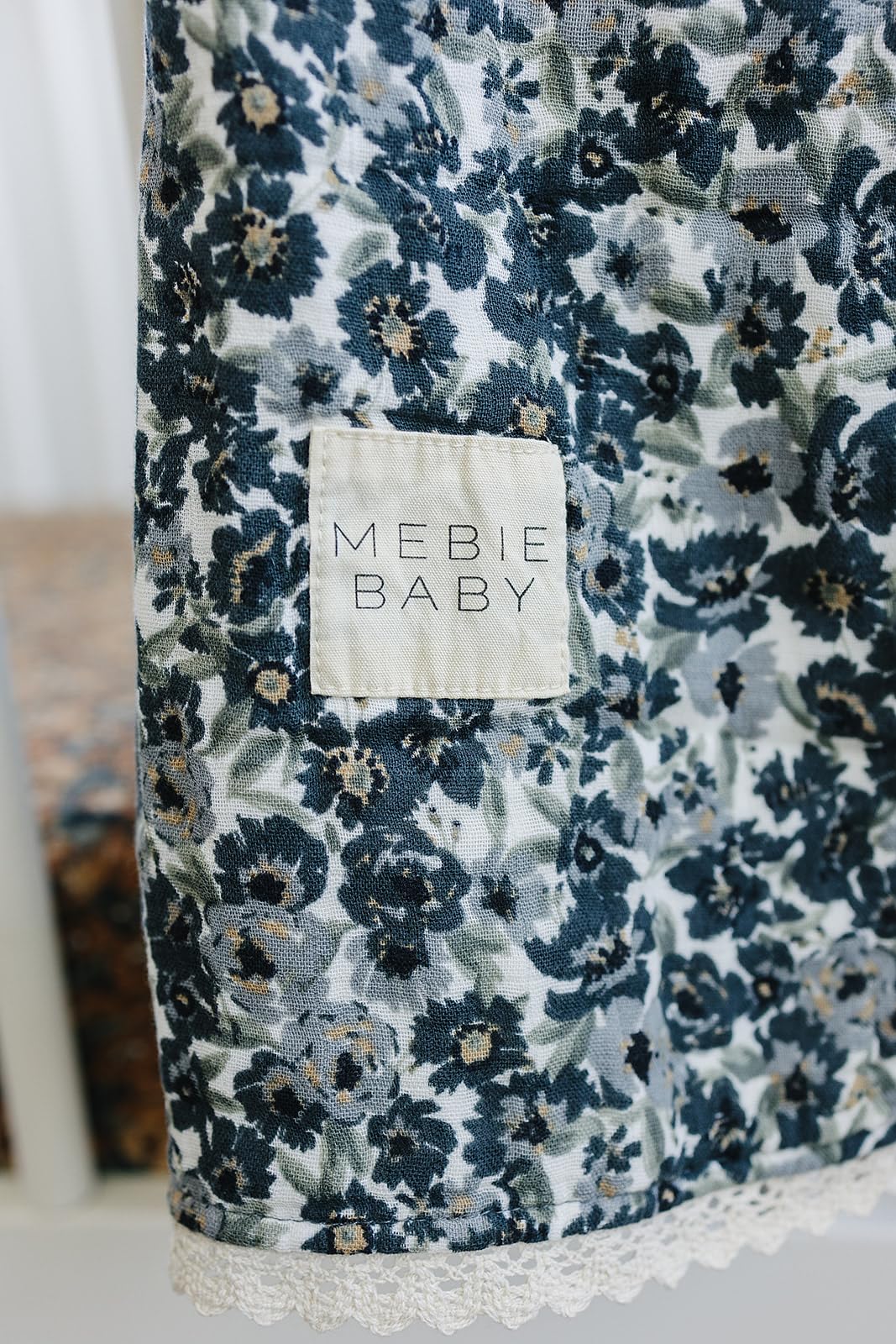 Mebie Baby Quilt Liberty Floral folded demonstrating easy storage and compact travel companion