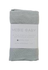 Mebie Baby Stone Swaddle blanket folded for a serene nursery appeal.