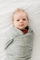 Mebie Baby Desert Sage swaddle packaged for gifting or baby registry.