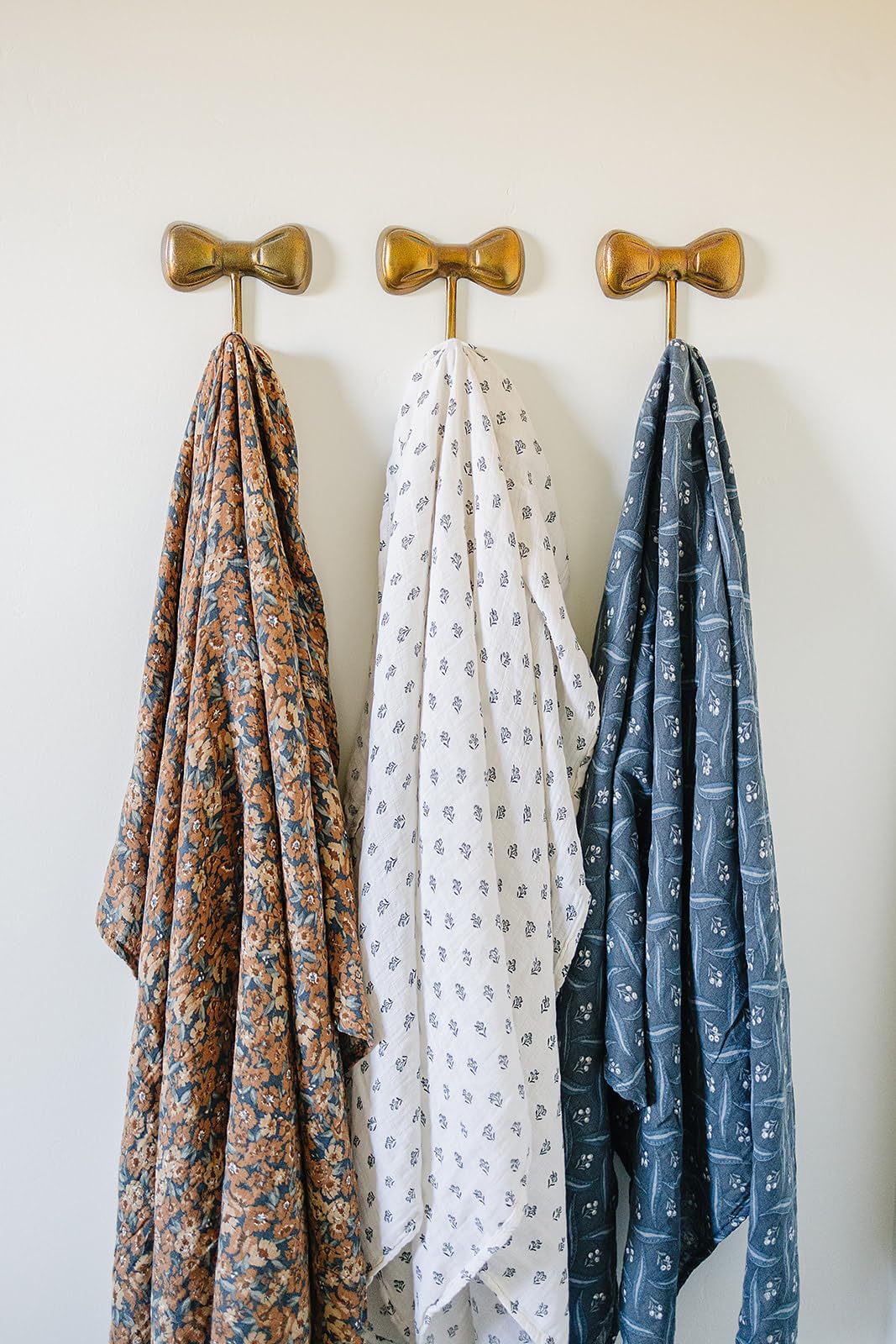 Mebie Baby Venetian Floral Swaddle flat lay showing modern design and nursery-ready look.