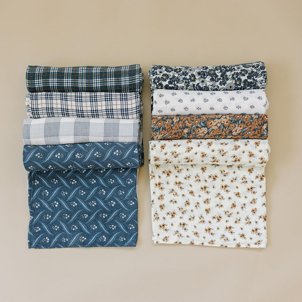 Mebie Baby Venetian Floral Swaddle folded to show versatile blanket-like use.