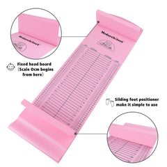 Medarchitect baby height measuring mat pink close-up scale shows dual-inch and centimeter readouts.