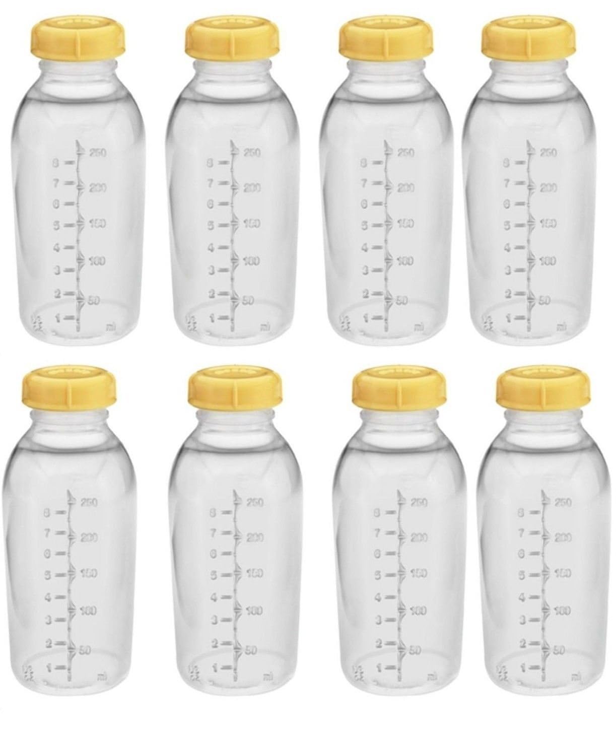 Medela bottle lids close-up, leak-proof design for travel and fridge storage.