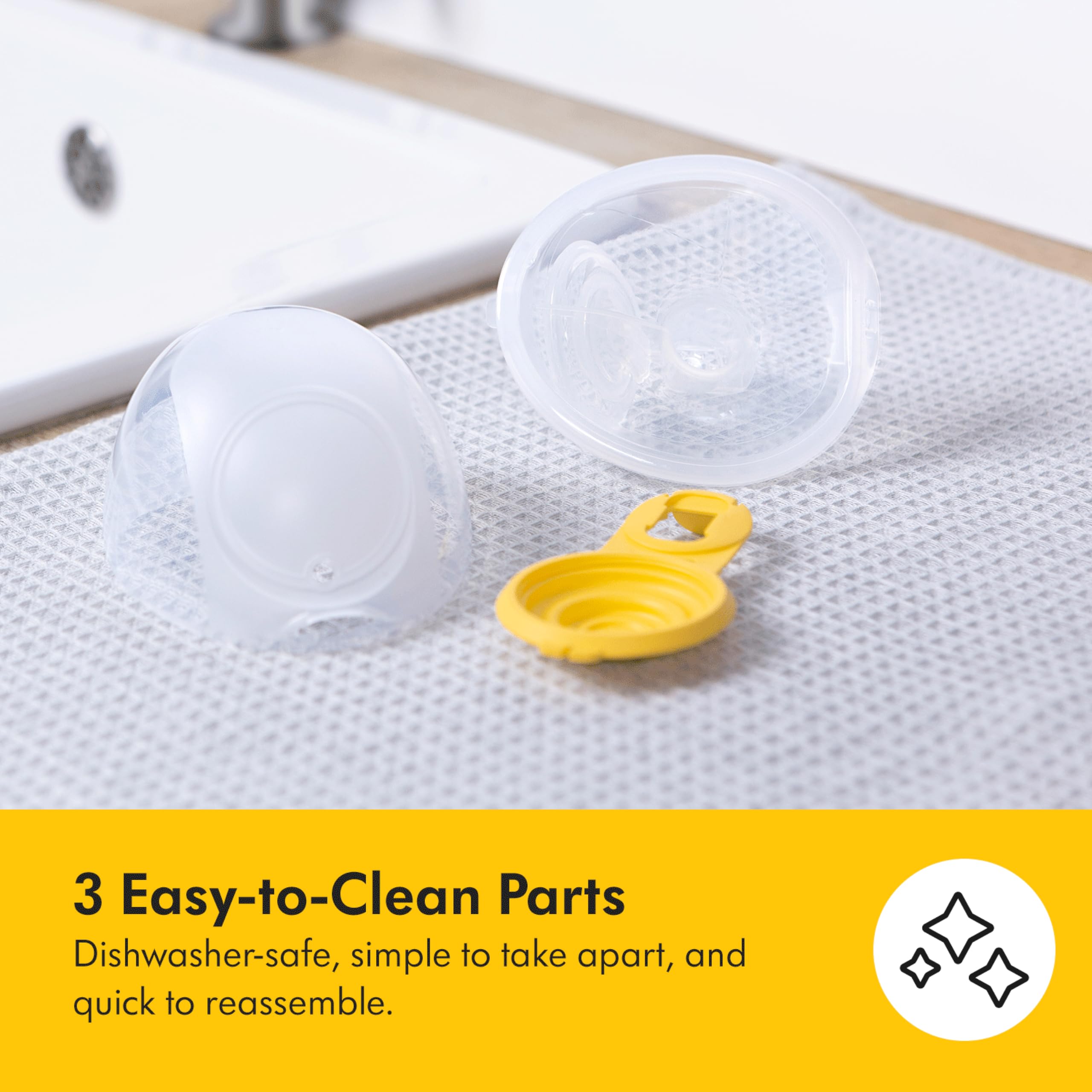 Medela wearable cups tucked in bra for discreet comfort.