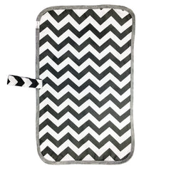 Medsuo changing mat laid flat with roomy baby area for comfortable diapering.