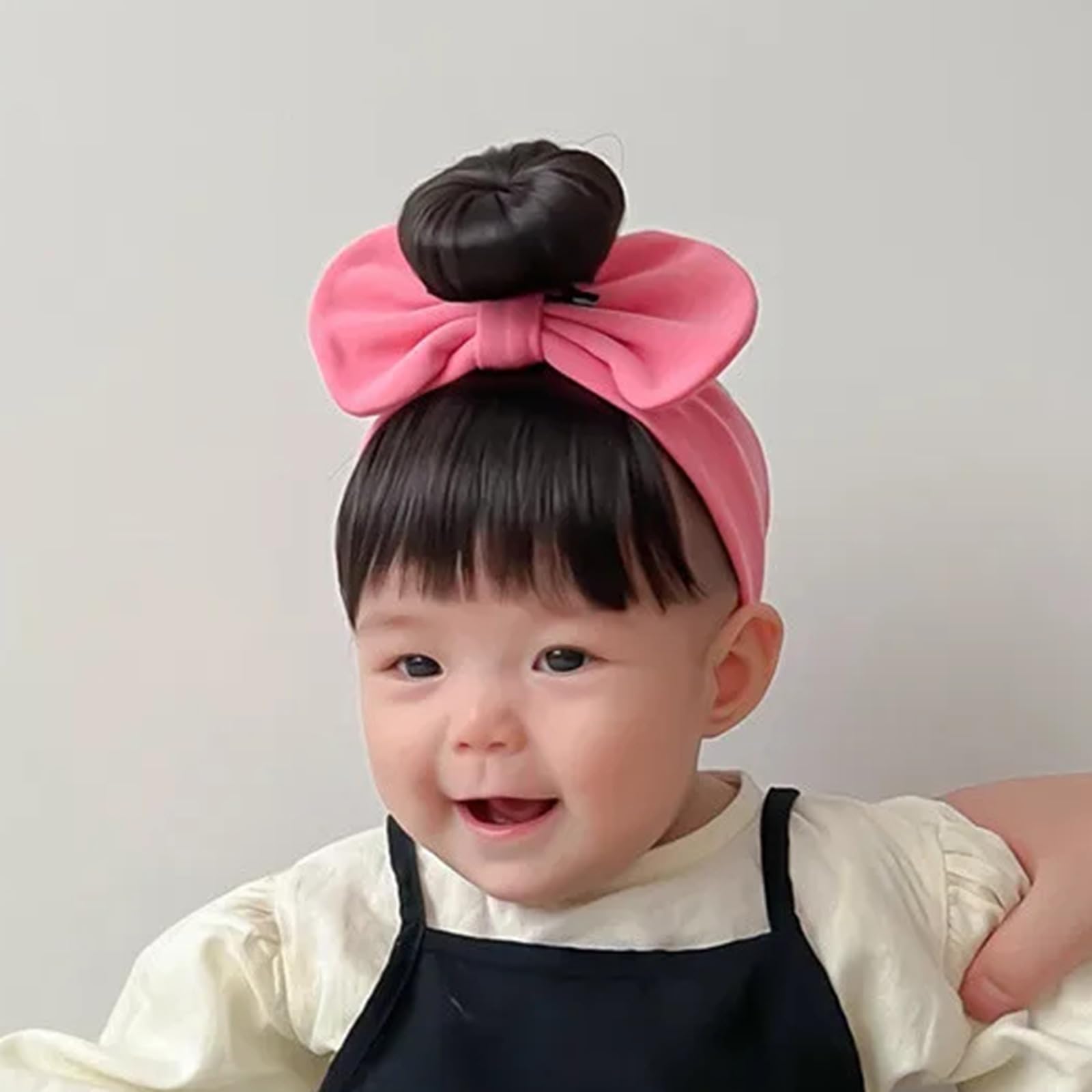 MEELYHOME bowknot wig on baby during party-looks ready for birthdays or events