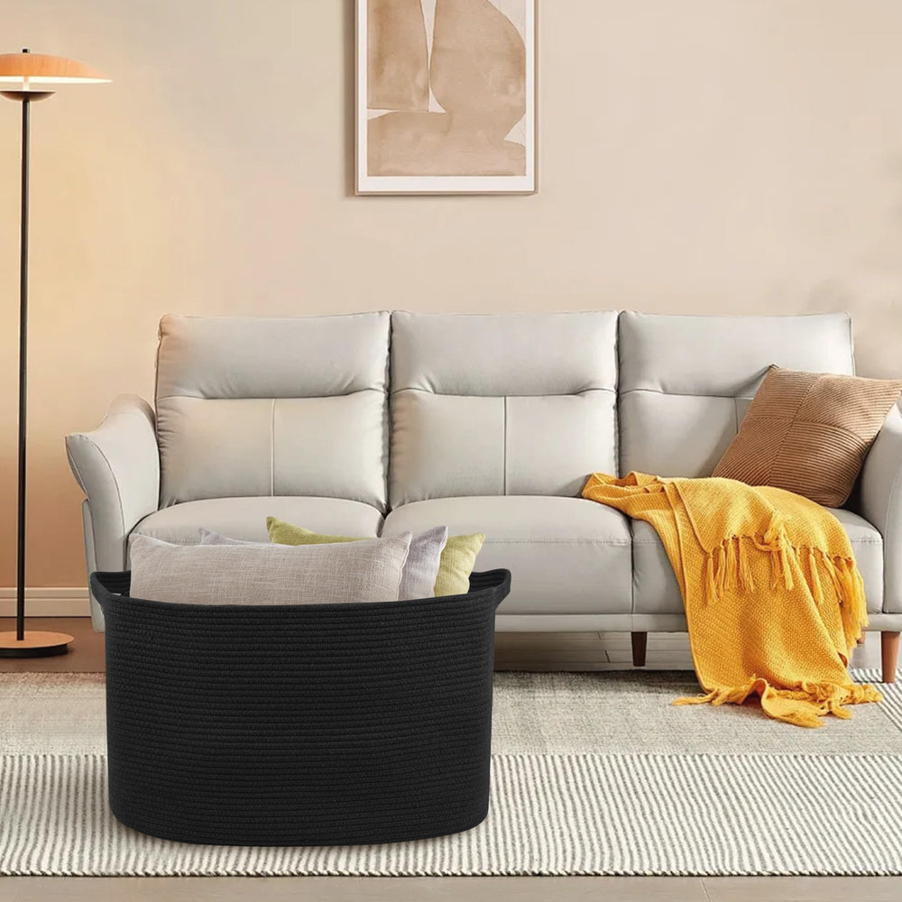 MEGASKET black storage basket blends with decor while organizing items across rooms.