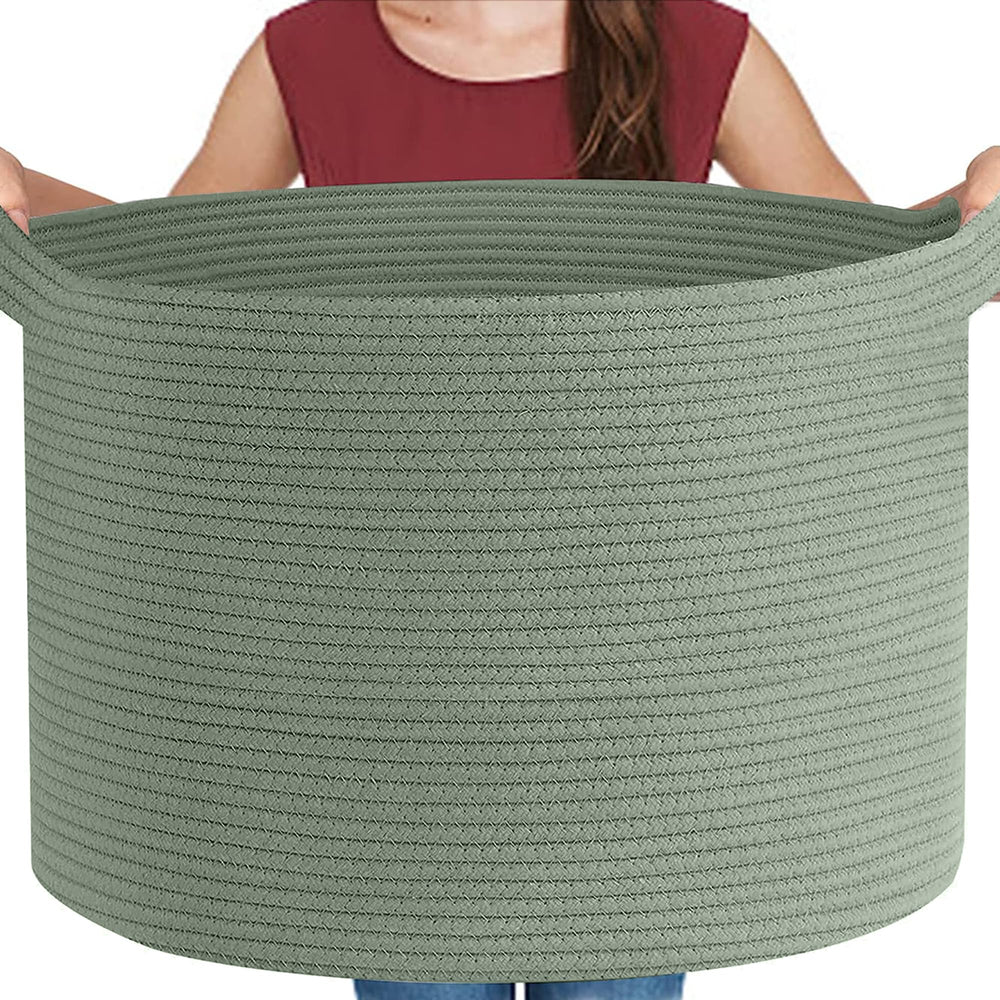 MEGASKET extra-large green basket closeup shows soft cotton rope and sturdy construction for blanket storage.