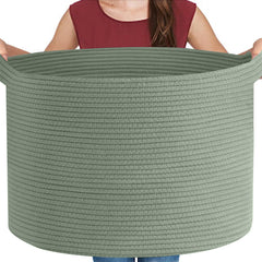 MEGASKET extra-large green basket closeup shows soft cotton rope and sturdy construction for blanket storage.