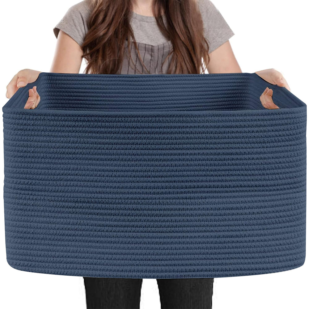MEGASKET extra-large rectangle storage basket filled with blankets in living room.