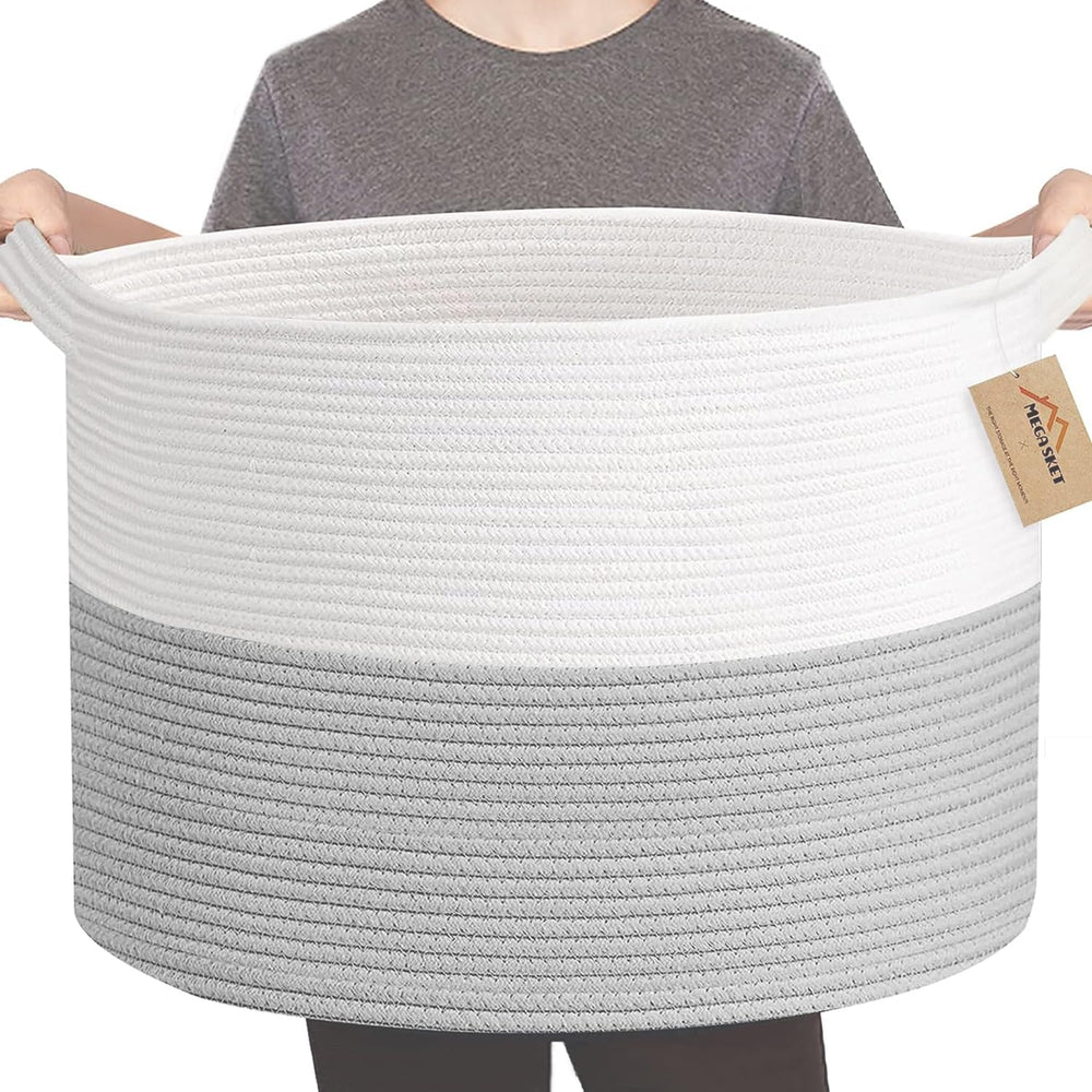 MEGASKET XXXL storage bin with blankets showing large-capacity organization beside the couch.