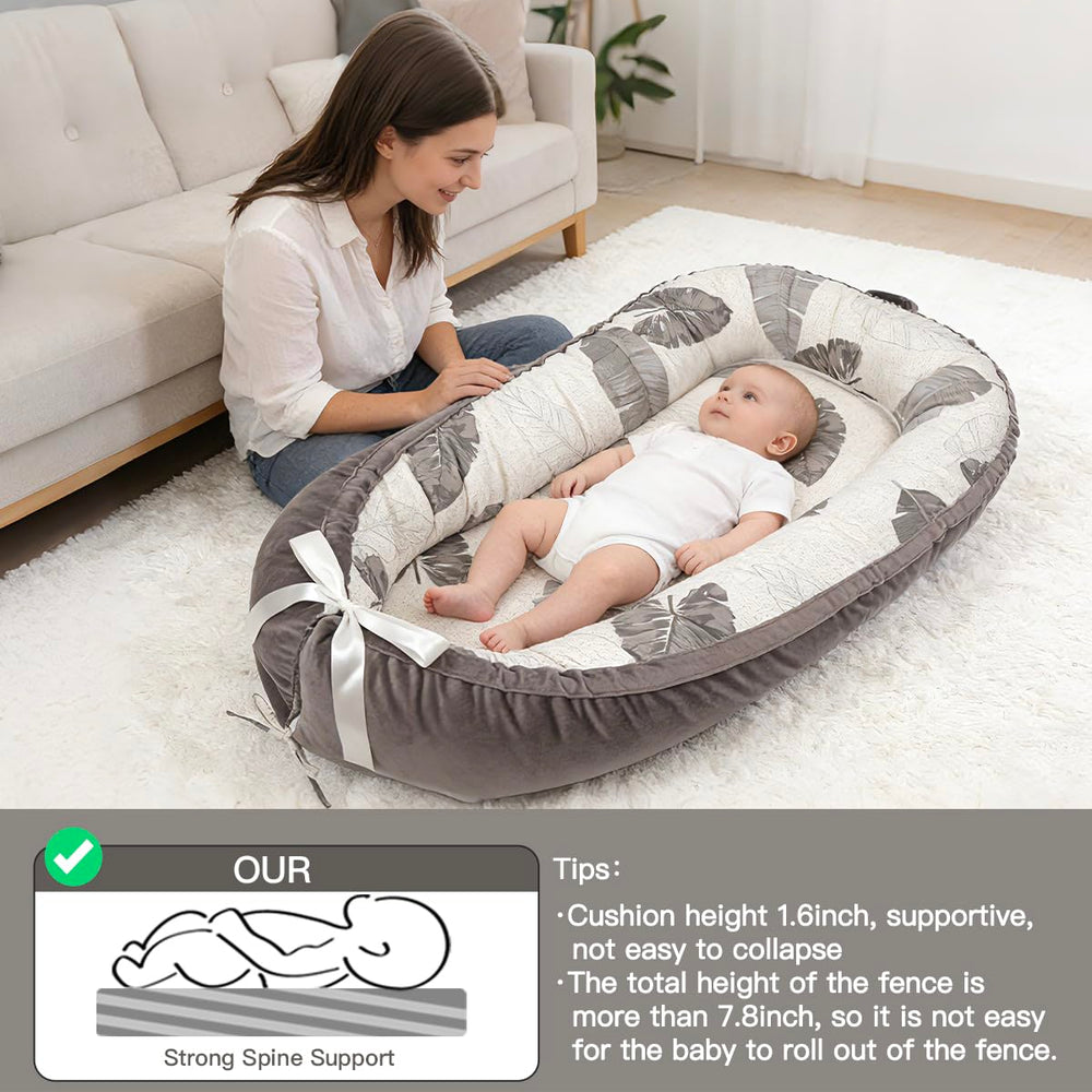 Meindoovm baby lounger CPSIA-certified safety label.