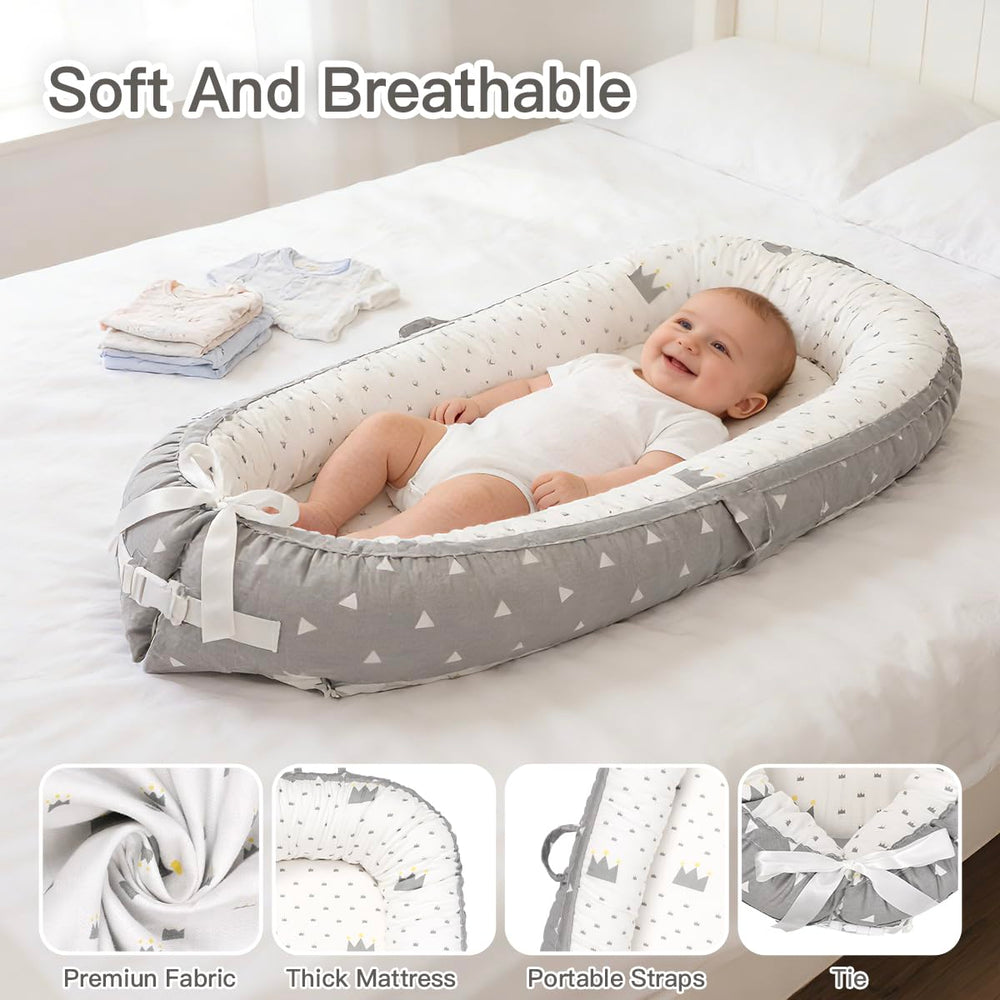 Meindoovm baby lounger showing reversible cover design for two looks.