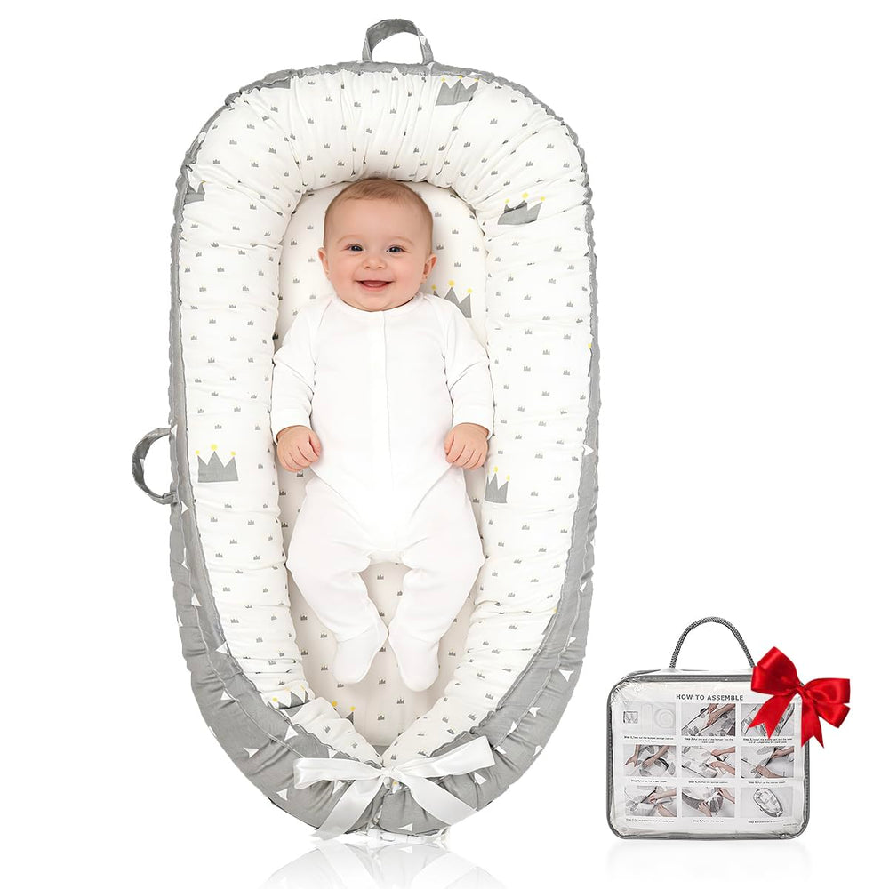 Meindoovm baby lounger with soft organic cotton surface for gentle daytime comfort.
