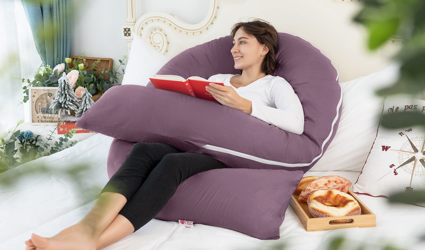 Meiz pillow supports side-lying comfort and belly relief.