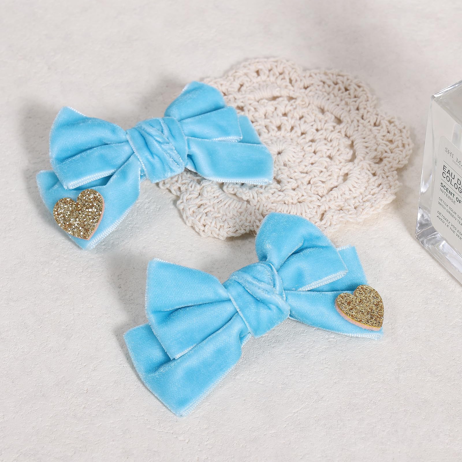 Melyde blue velvet hair clip enhances festive looks at Christmas and New Year.