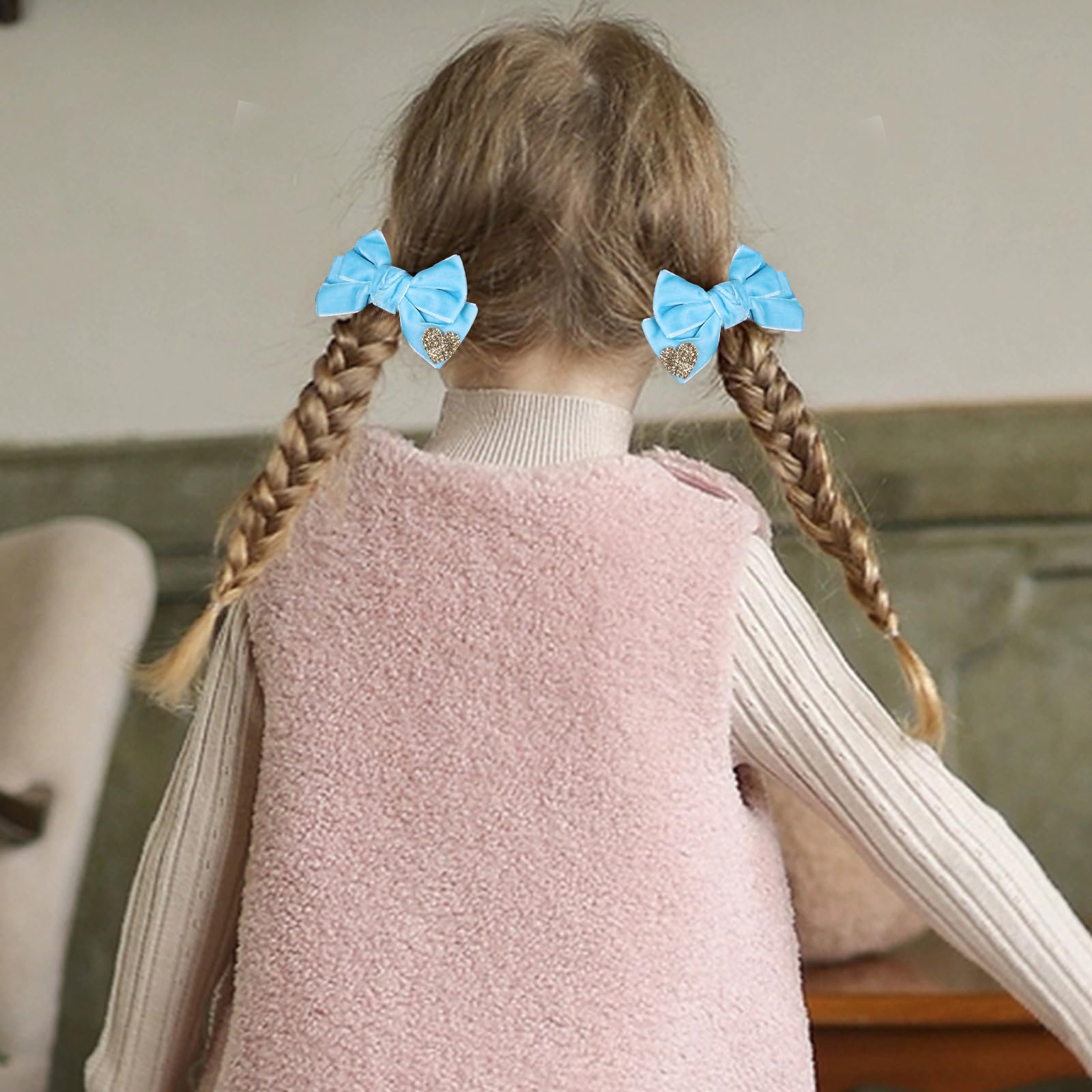Melyde kids' blue velvet hair accessory complements outfits for school or party days.