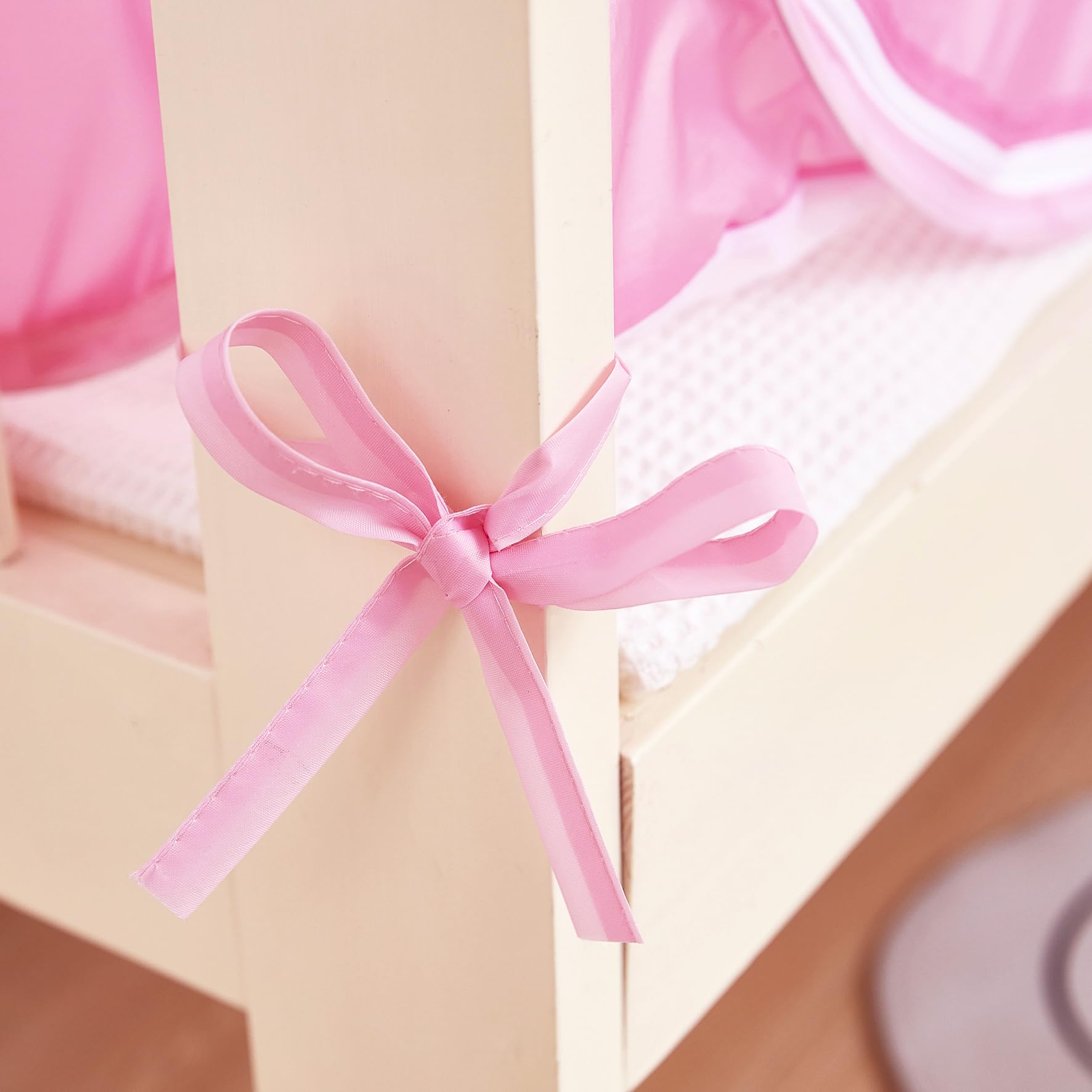 Mengersi pink canopy folds flat for travel and storage.