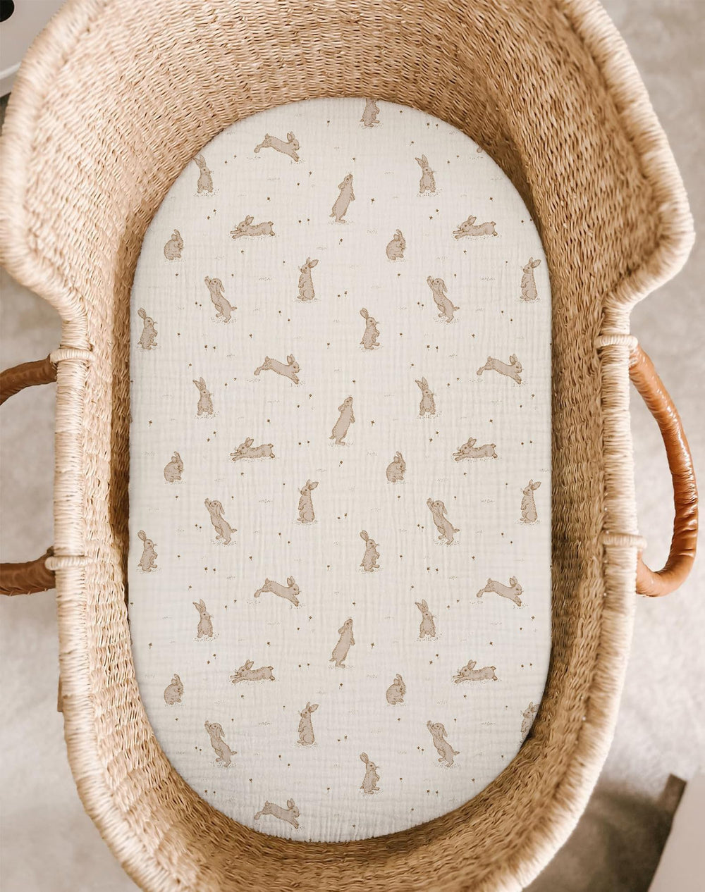 Meowcards bassinet sheet closeup highlights soft muslin fabric for gentle baby skin.