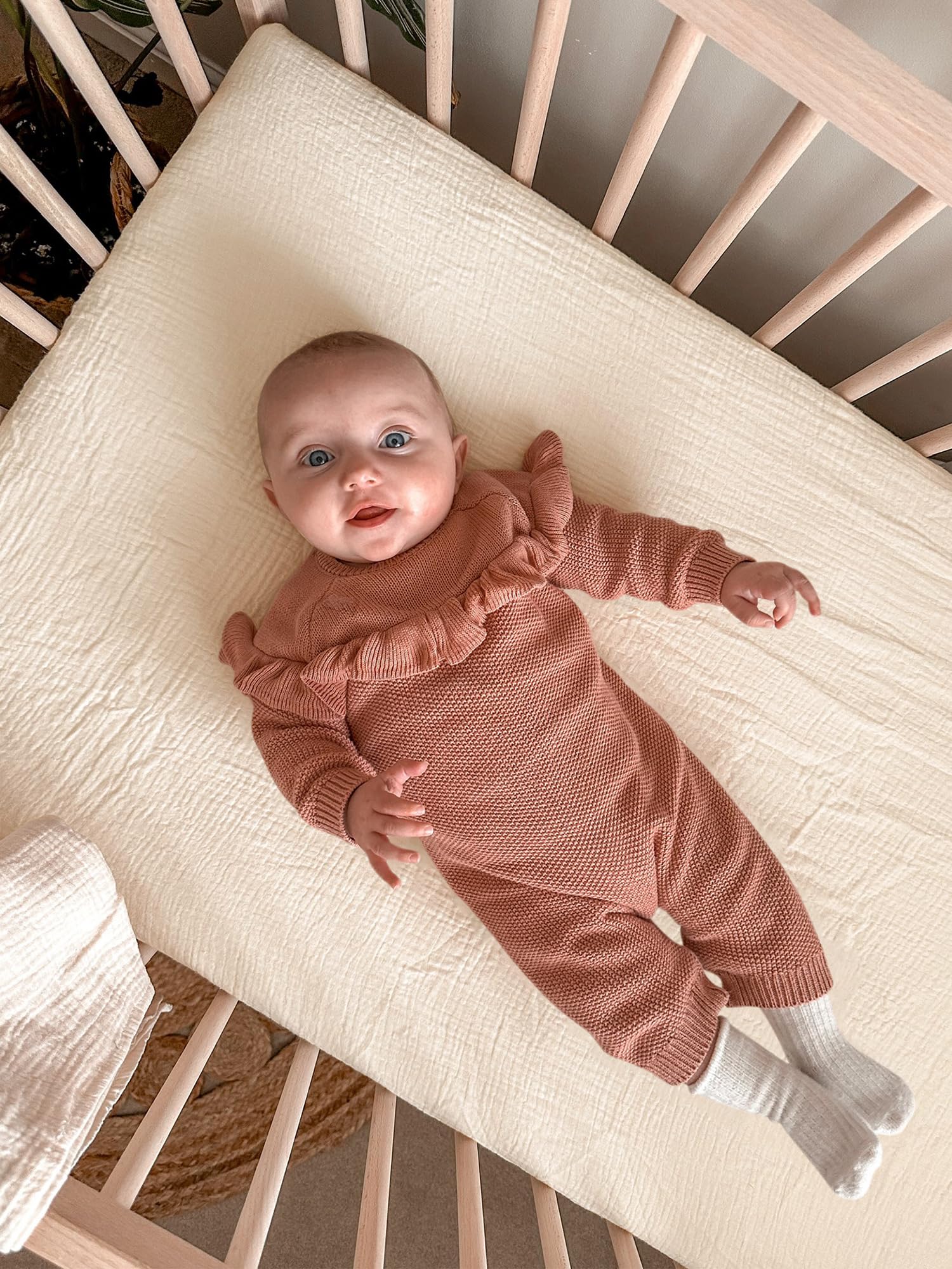 Meowcards bassinet sheet neutral nursery style complements decor.