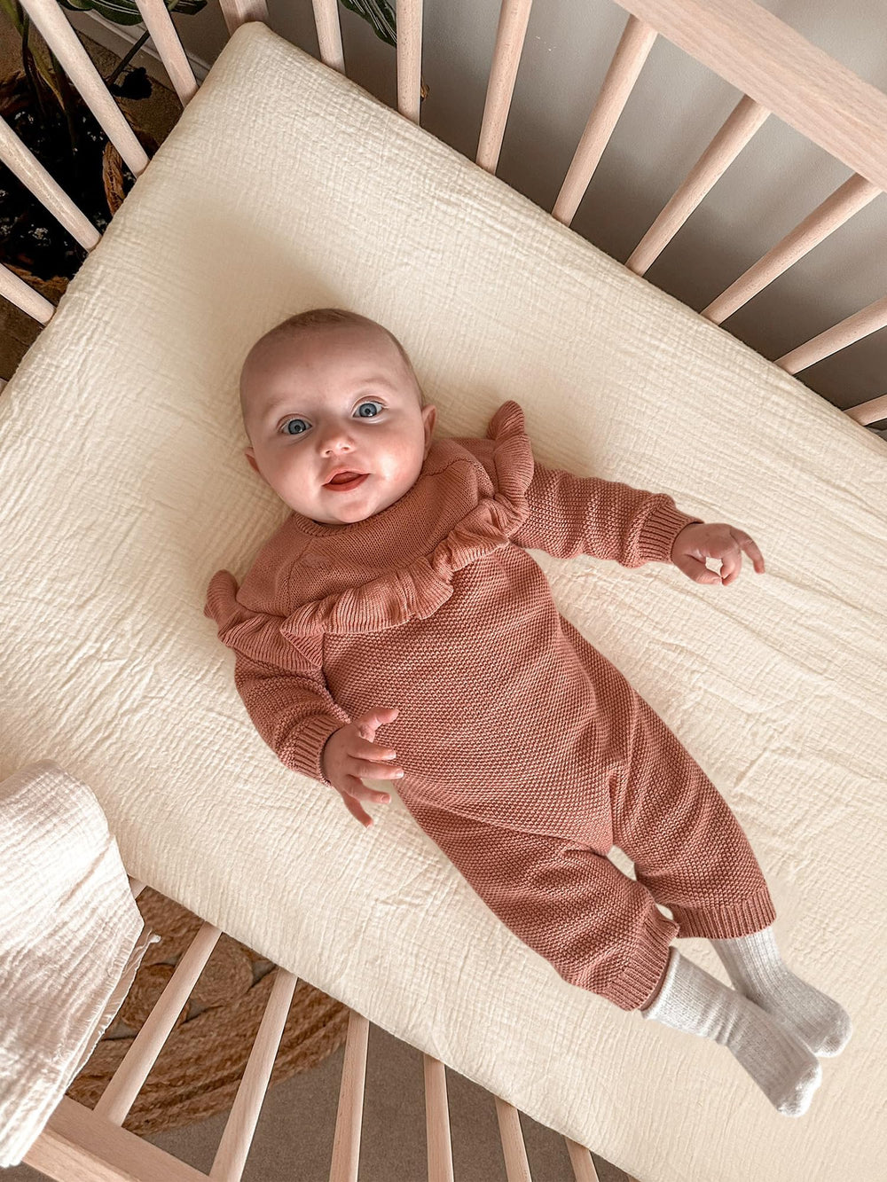 Meowcards bassinet sheet neutral nursery style complements decor.