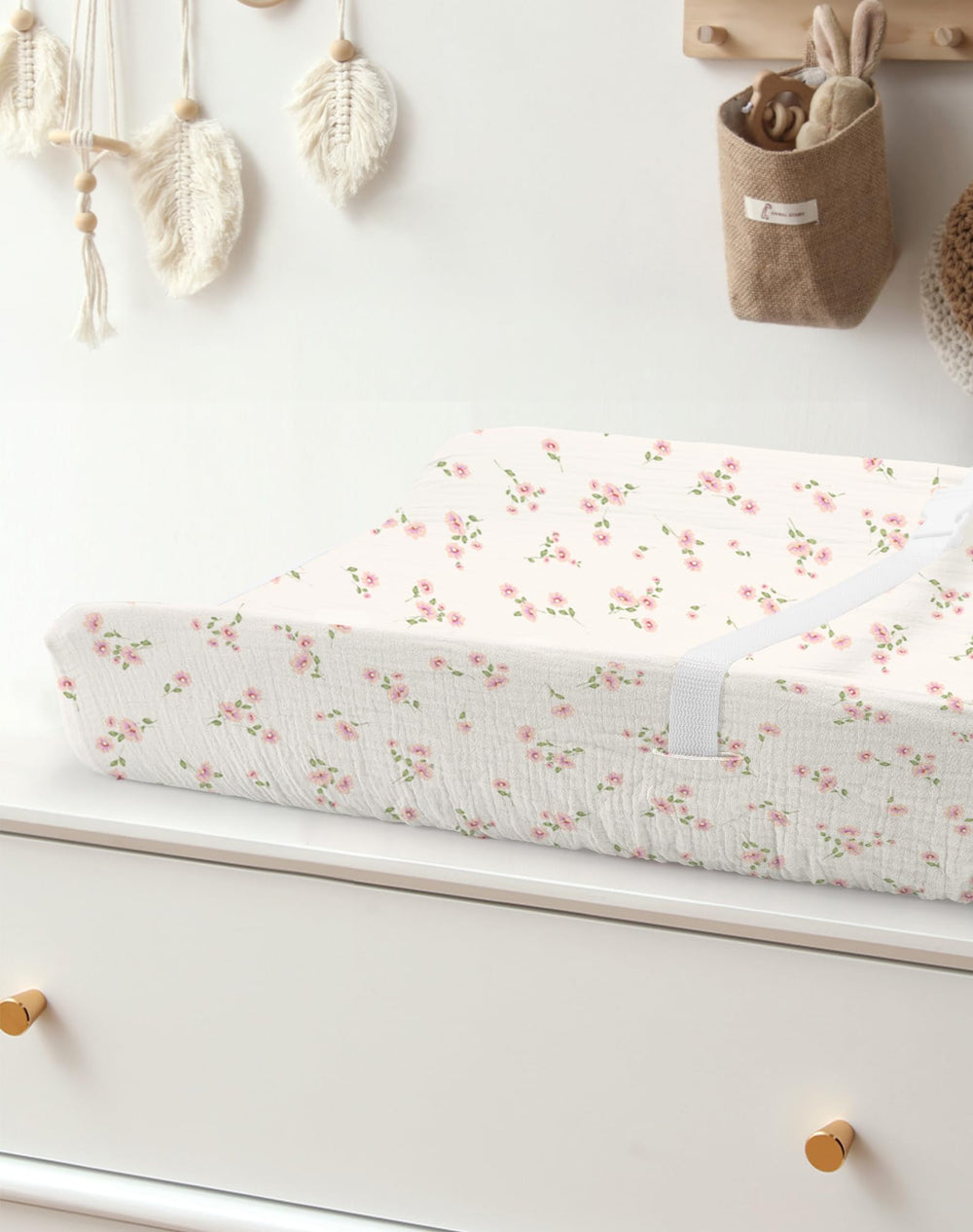 Meowcards Changing Pad Cover Rosy neutral boho design enhances nursery decor.
