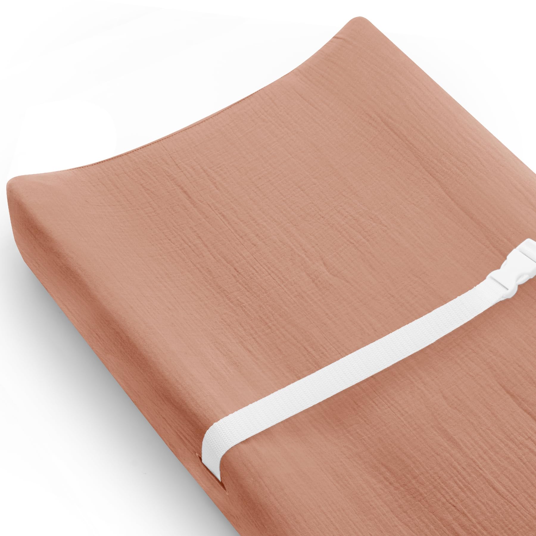 Meowcards dusty rose changing pad cover closeup shows soft muslin texture for baby comfort.