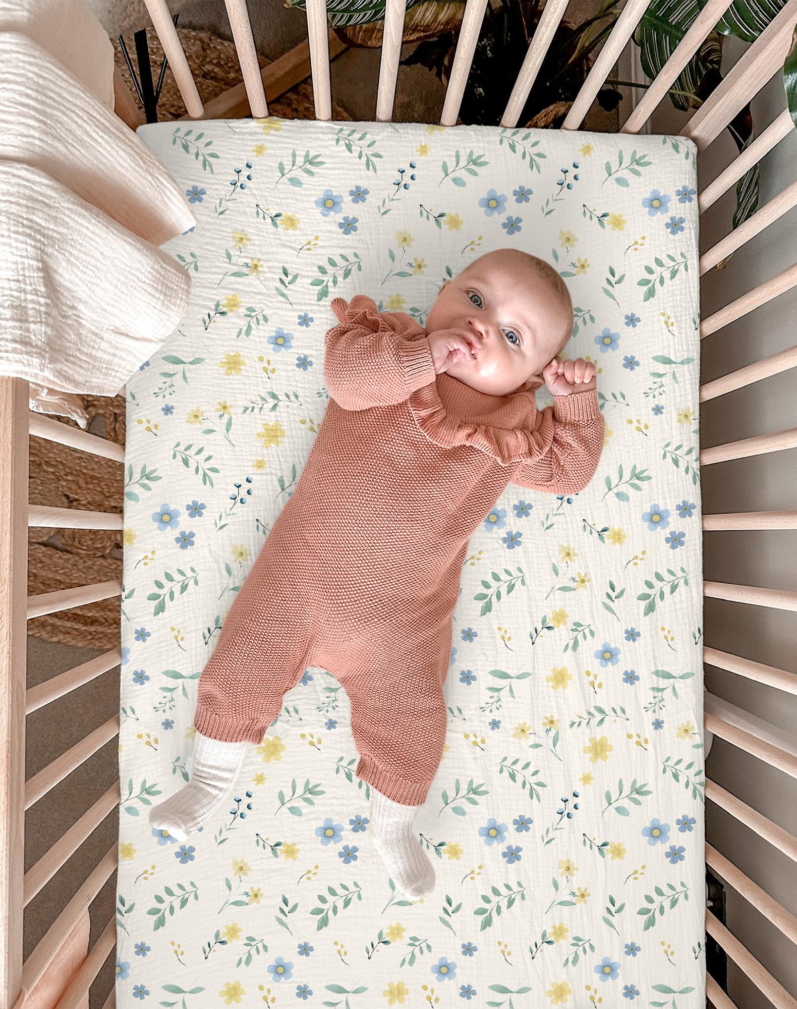 Meowcards mini crib sheet sage top view highlights neutral nursery styling and gentle skin-friendly fabric