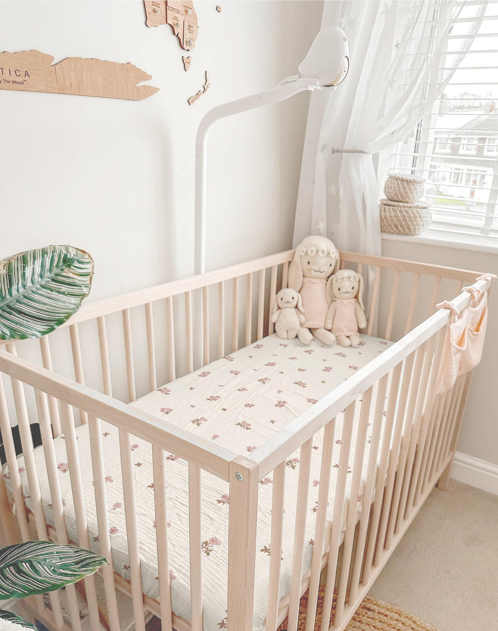 Meowcards mini crib sheets 24x38 size shown on mini crib mattress for snug fit