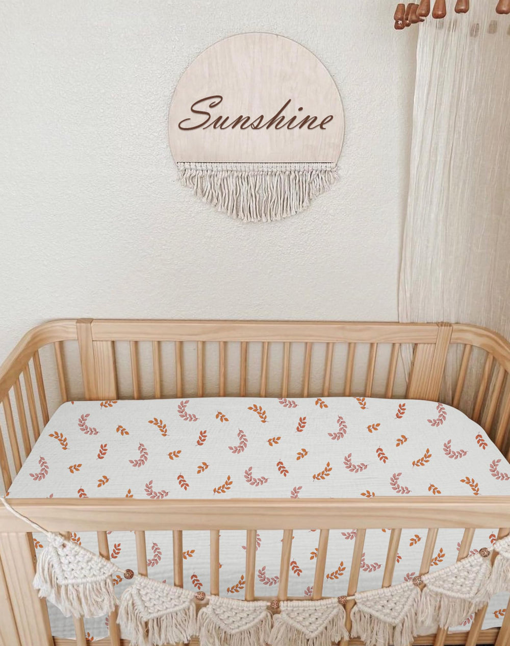 Meowcards mini crib sheets leaf pattern nursery shot demonstrates coordinated, calming decor.