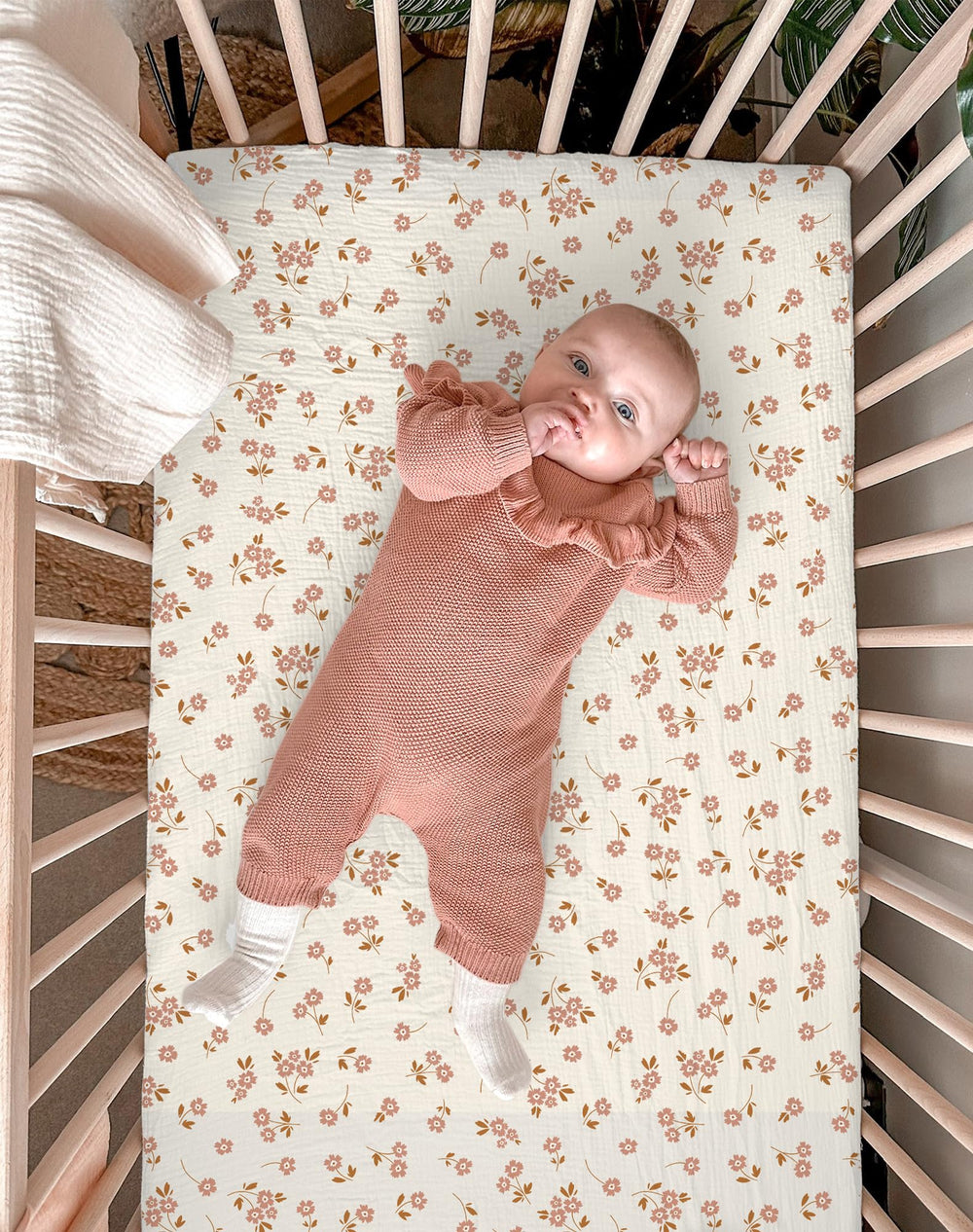 Meowcards mini crib sheets nursery decor tone coordinates with floral pink accents for a softer look.