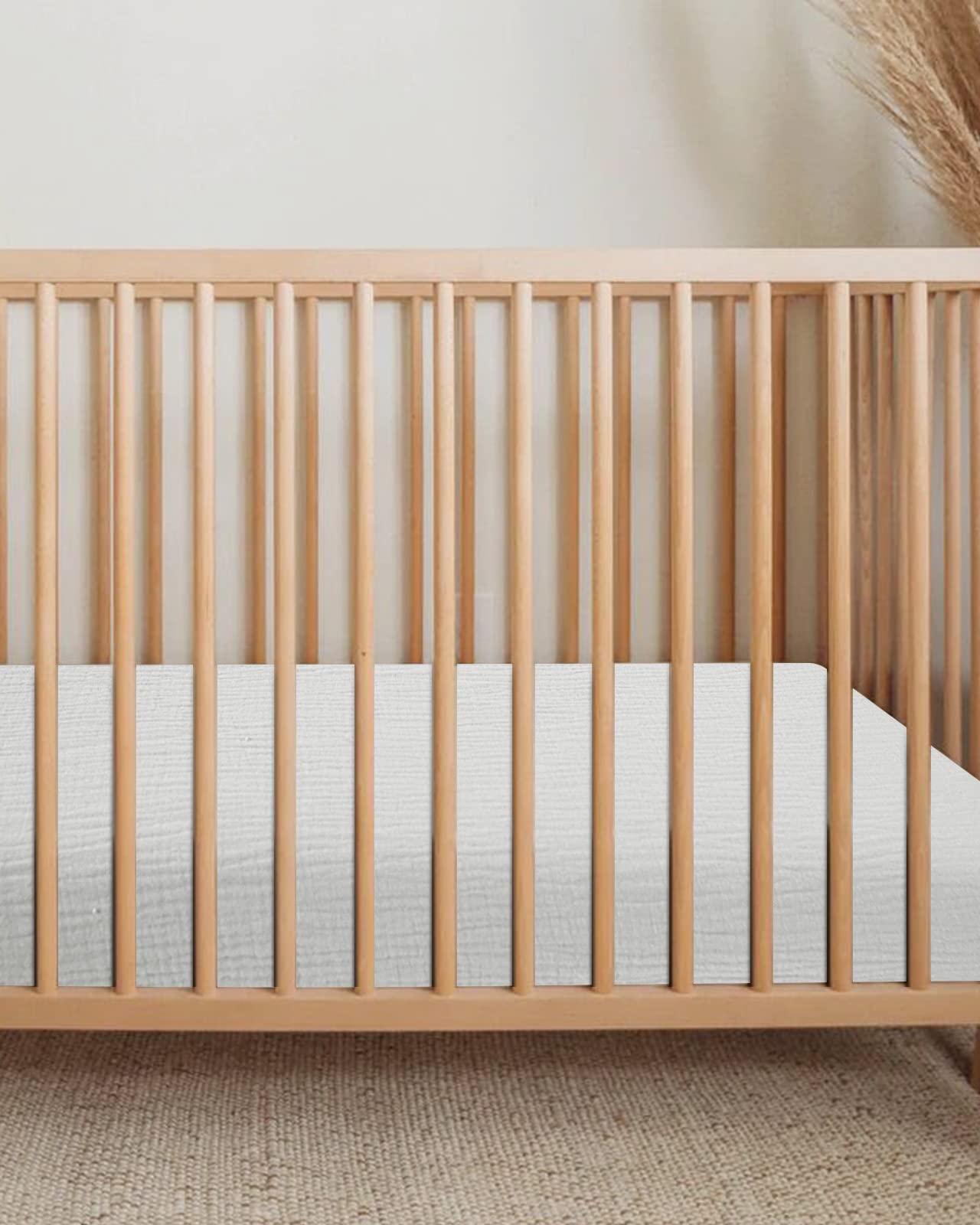Meowcards muslin cotton bassinet sheet offers soft texture and breathable comfort for nightly naps.