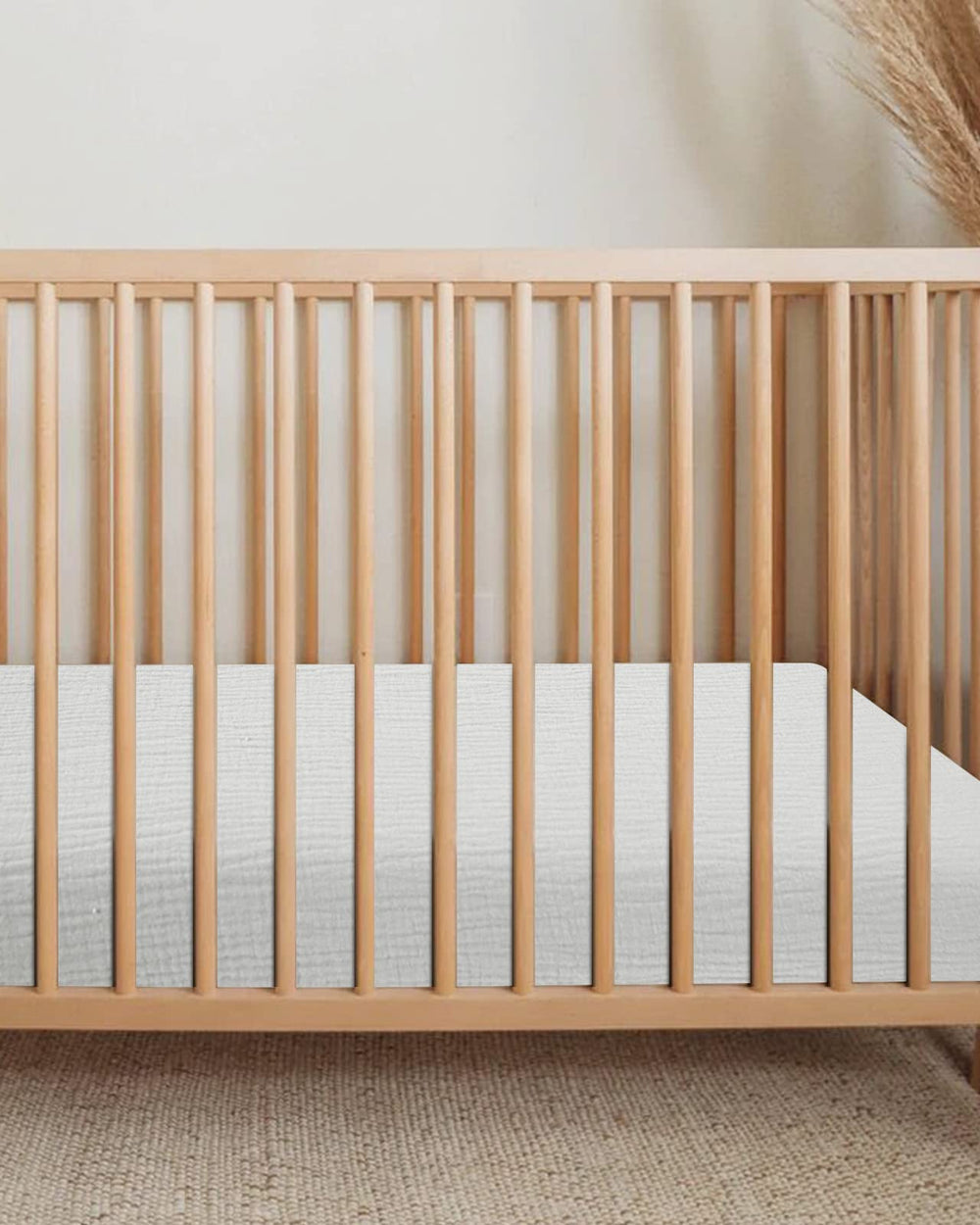 Meowcards muslin cotton bassinet sheet offers soft texture and breathable comfort for nightly naps.