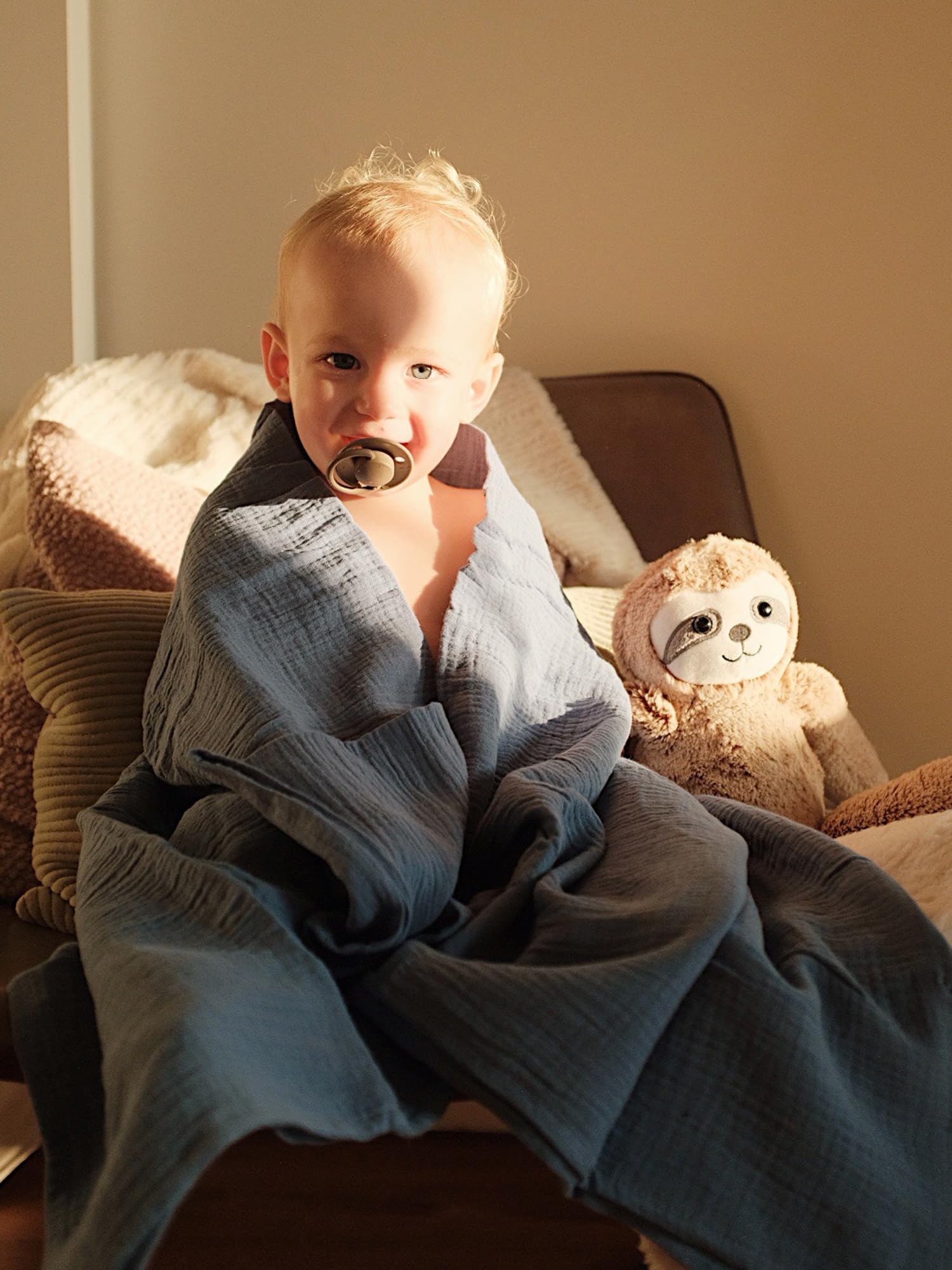 Meowcards muslin swaddle blanket on-the-go use provides lightweight warmth for babies.