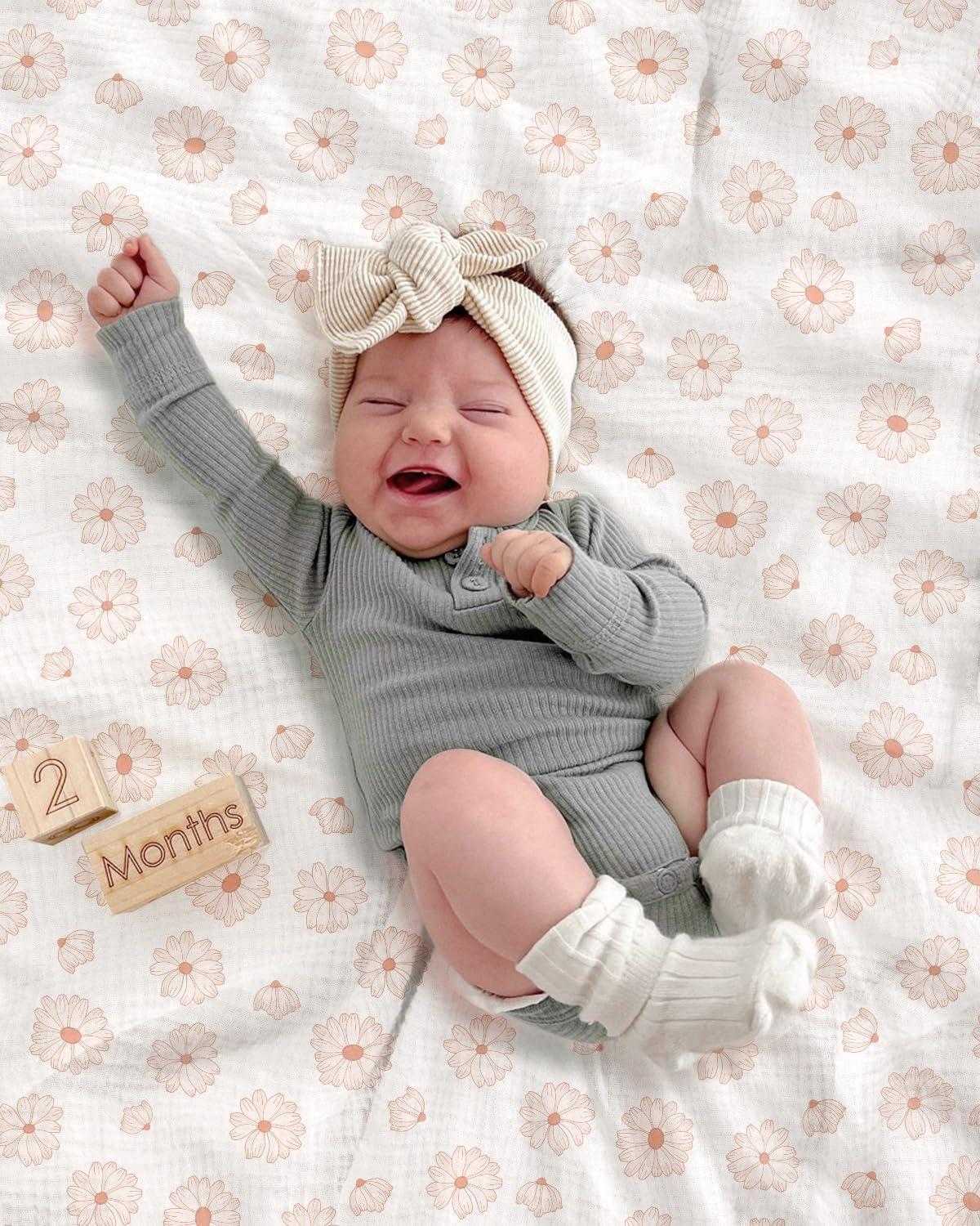Meowcards Muslin Swaddle Morandi colors convey calm nursery styling.