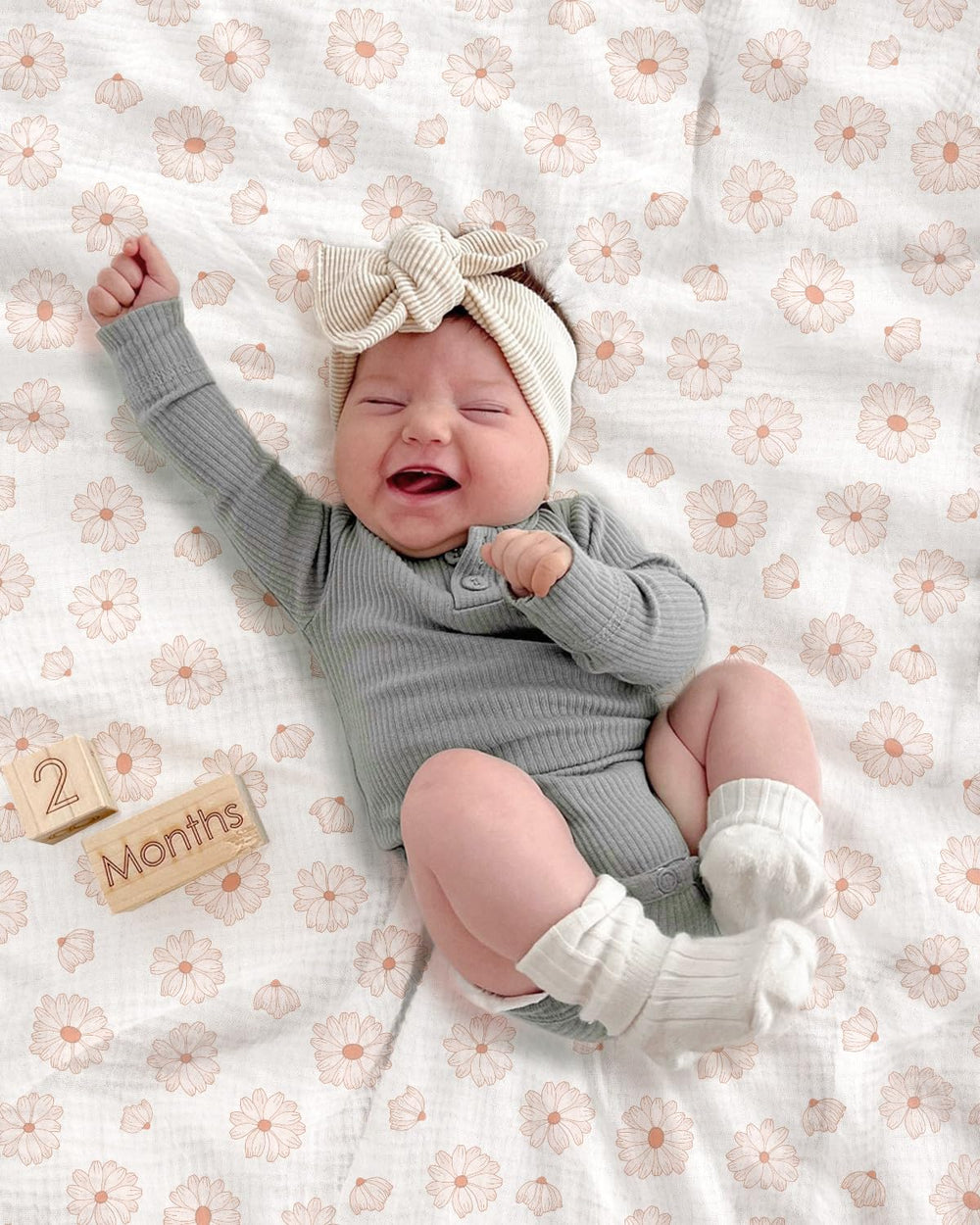 Meowcards Muslin Swaddle Morandi colors convey calm nursery styling.