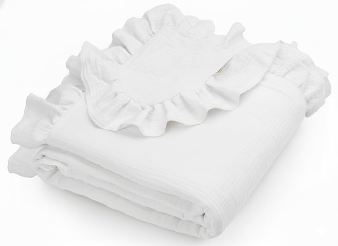 Meowcards Muslin Swaddle with ruffled edges for a stylish newborn photo shoot.