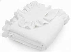 Meowcards Muslin Swaddle with ruffled edges for a stylish newborn photo shoot.