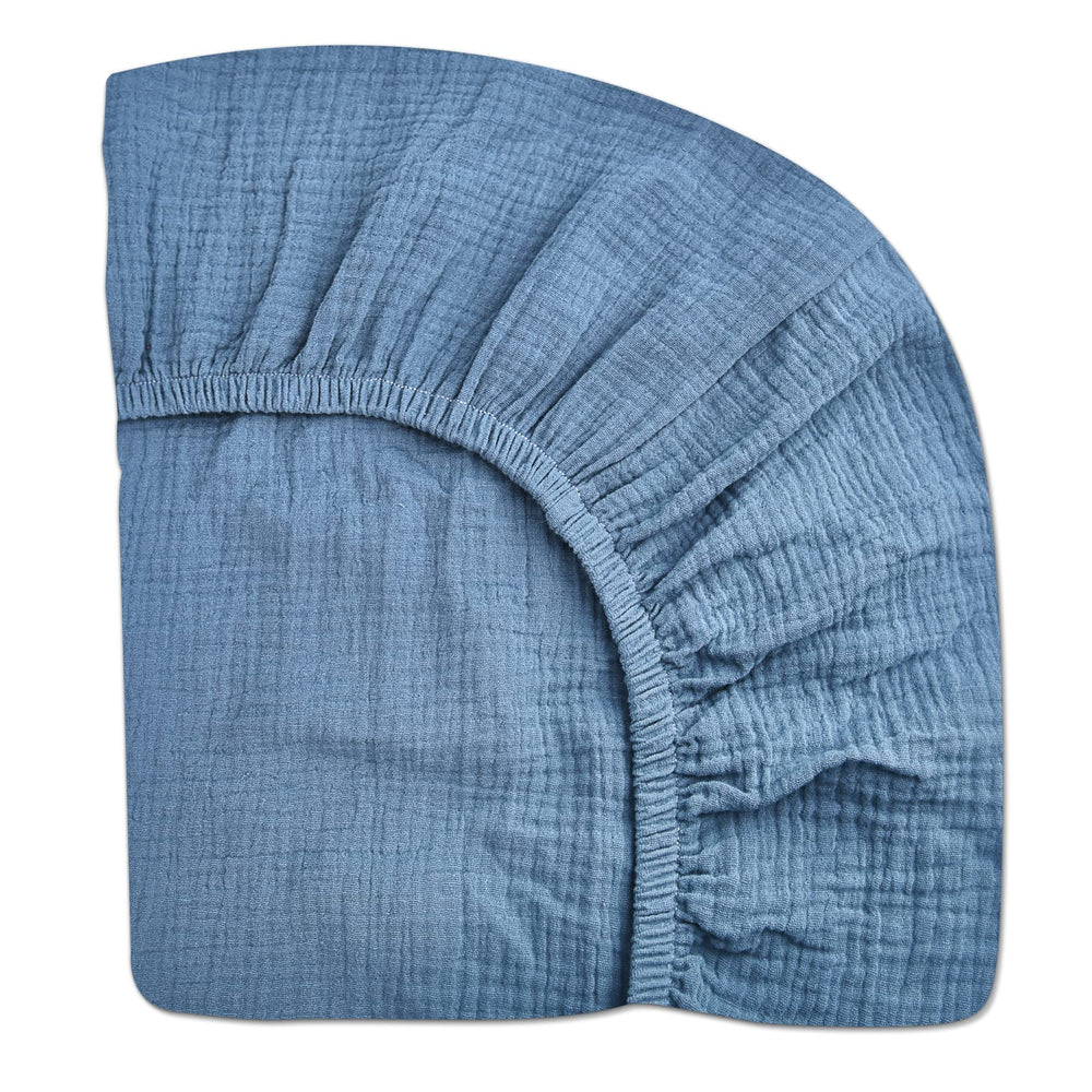 Meowcards pack n play sheet blue closeup highlighting soft muslin texture for gentle sleep.